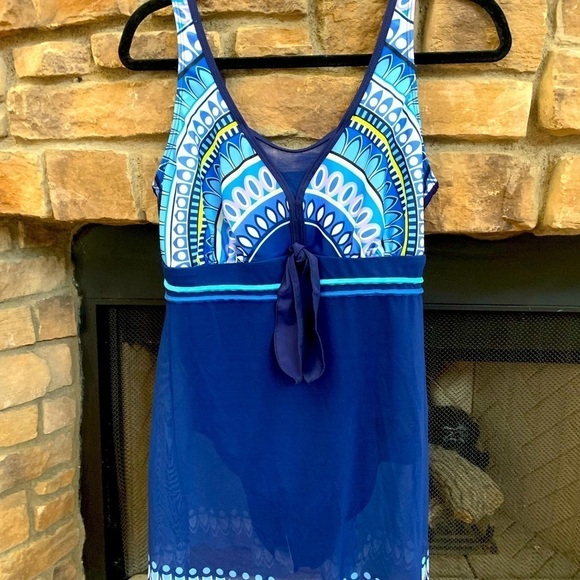 Blue one piece with sheer overlay. Large